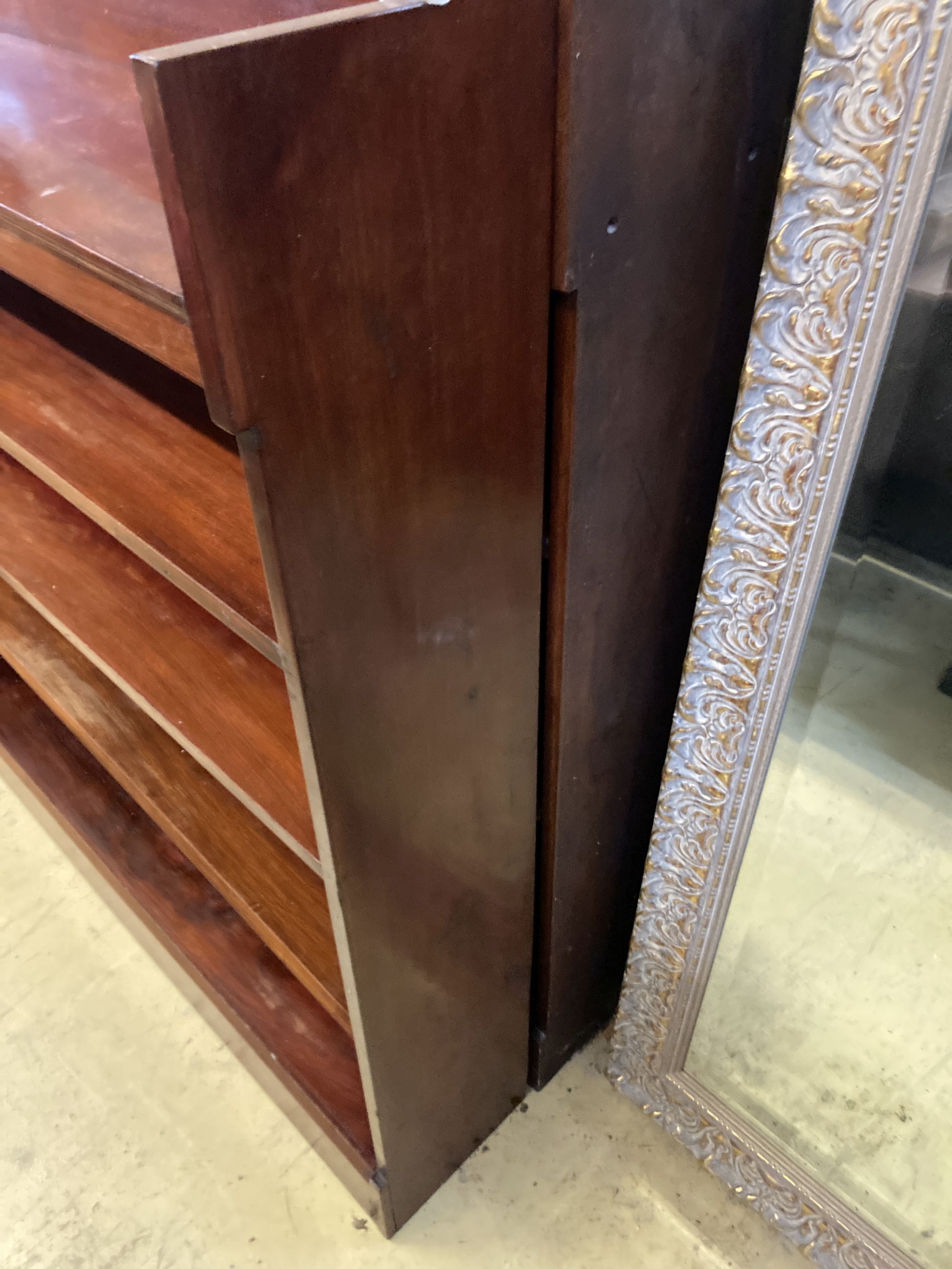 A pair of Victorian mahogany open bookcases, width 127cm, depth 24cm, height 126cm